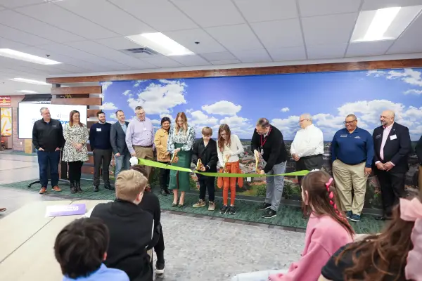 Students, Meta Representatives, Newark Mayor Jeff Hall, and Superintendent of Newark City Schools cut the ribbon.